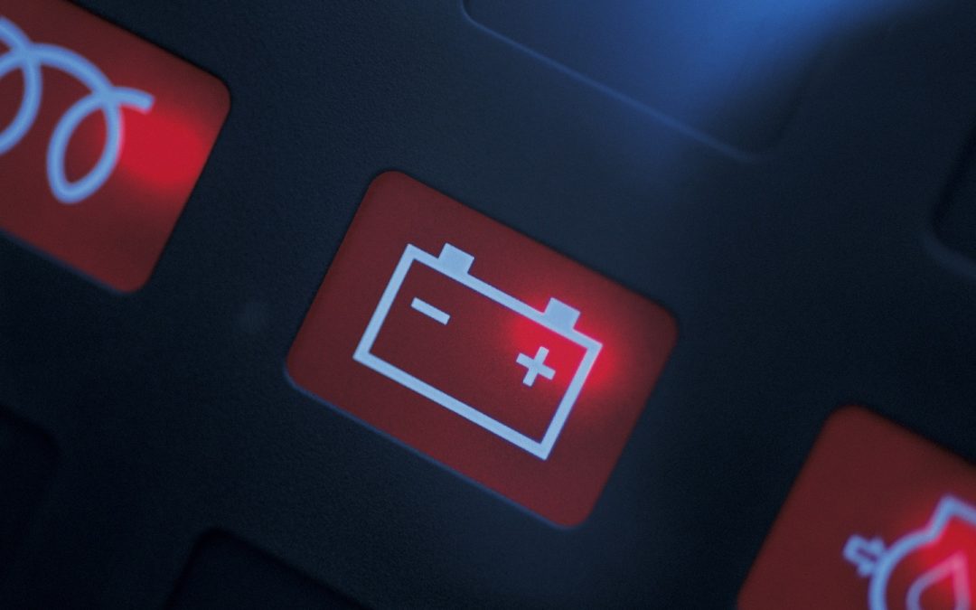 The battery light is on on an engine dashboard.